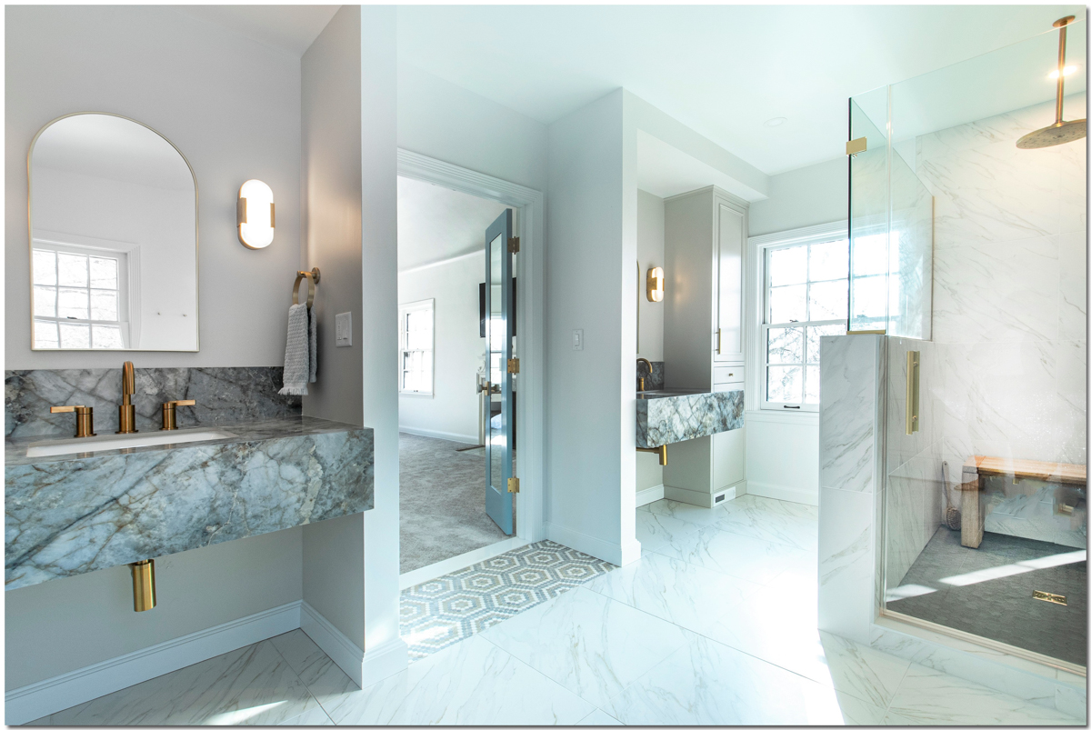 Master bathroom remodel with porcelain vanity, marble tile and tile shower